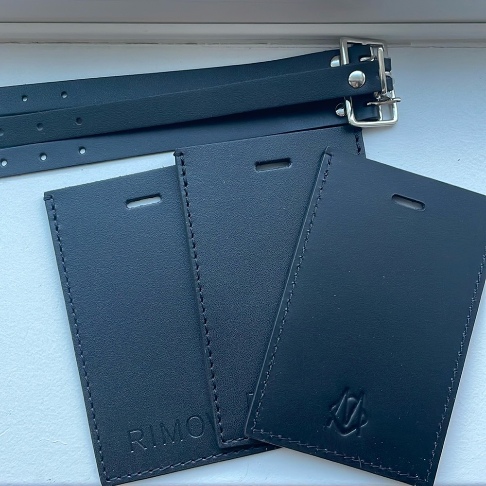 3 Rimowa luggage tags. Never used.